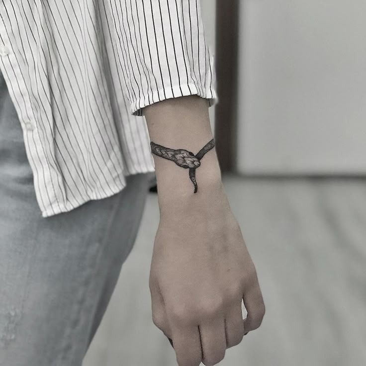 Subtle Snake Bracelet Tattoo Design