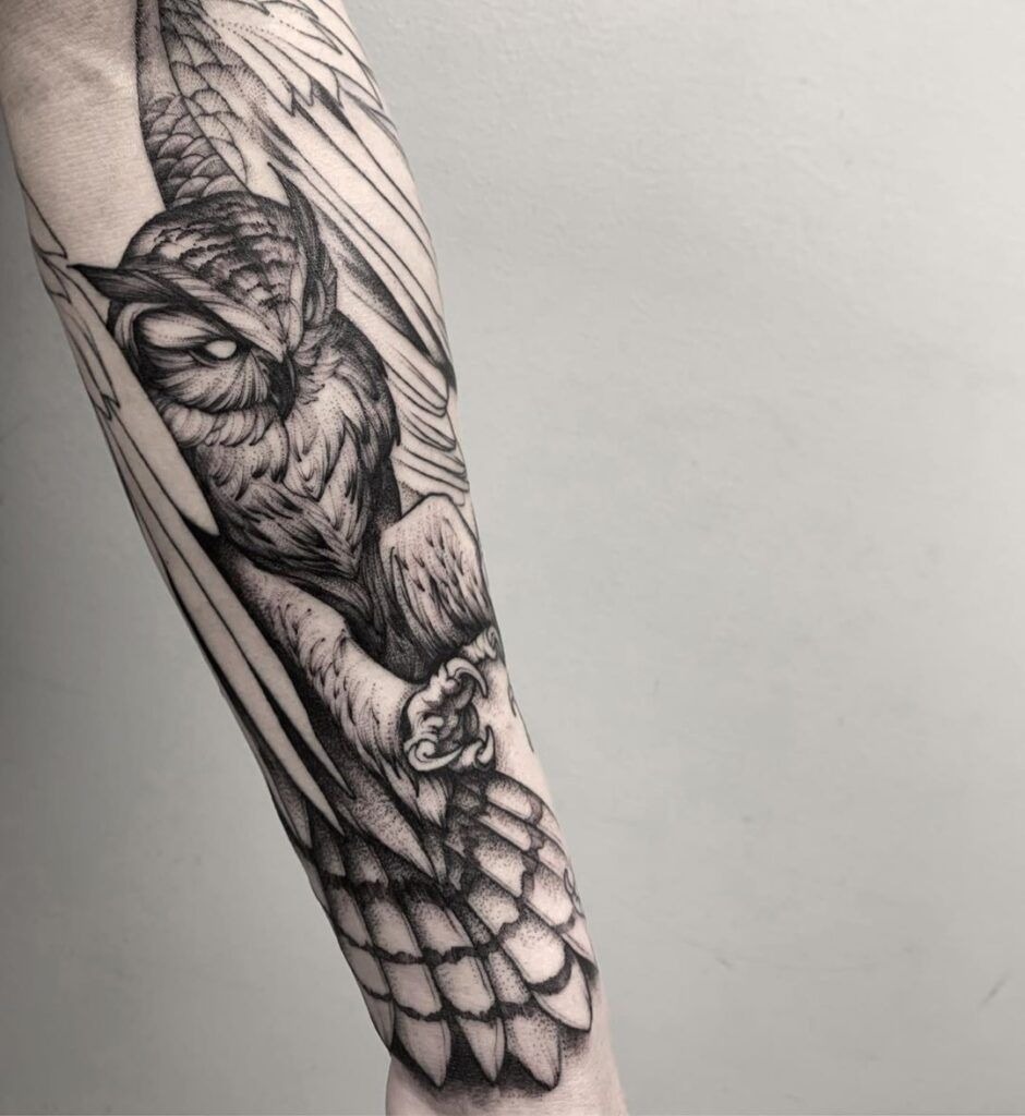 Dramatic Owl Forearm With Talons Tattoo Design