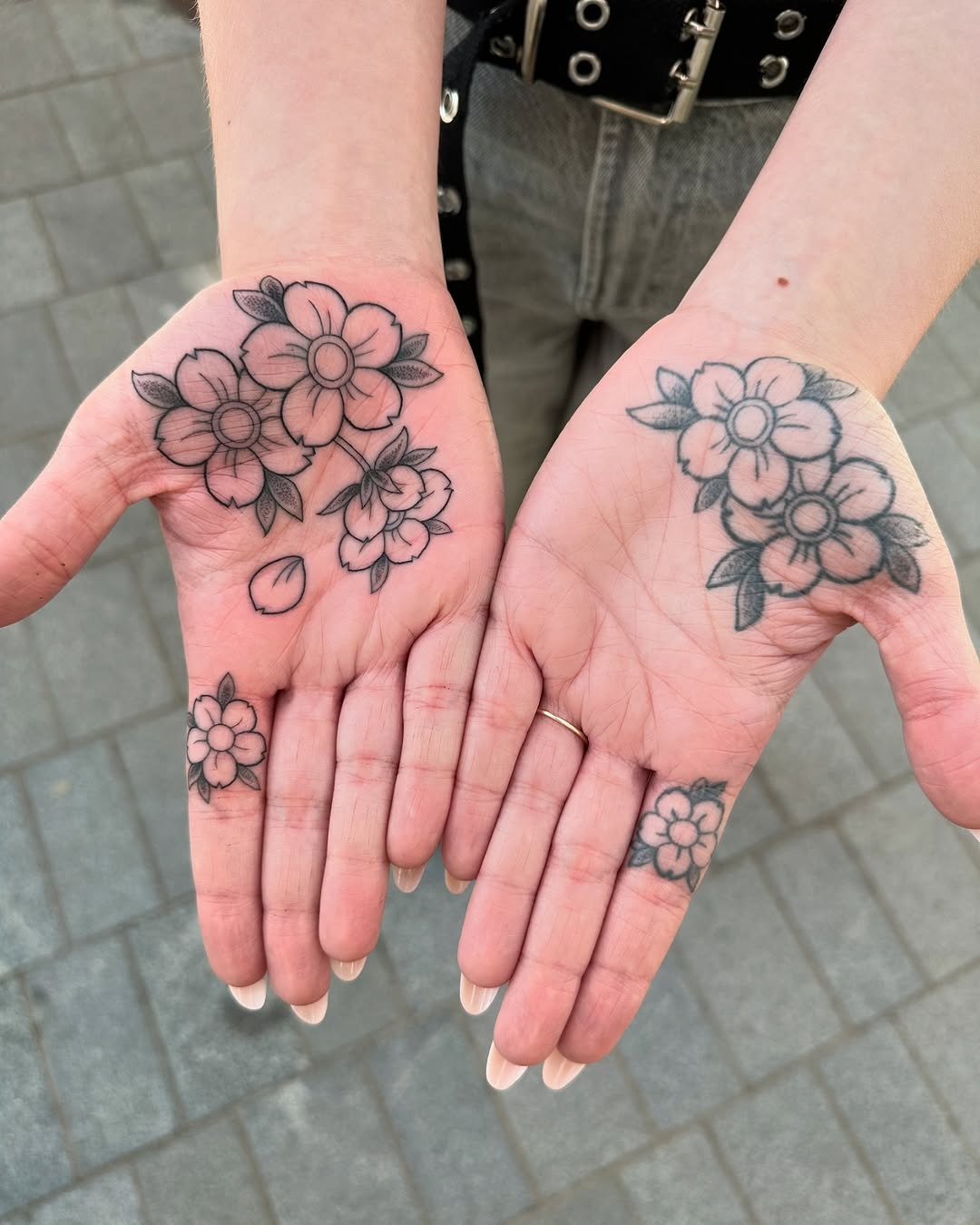 Delicate flower tattoos on both palms Tattoo Design