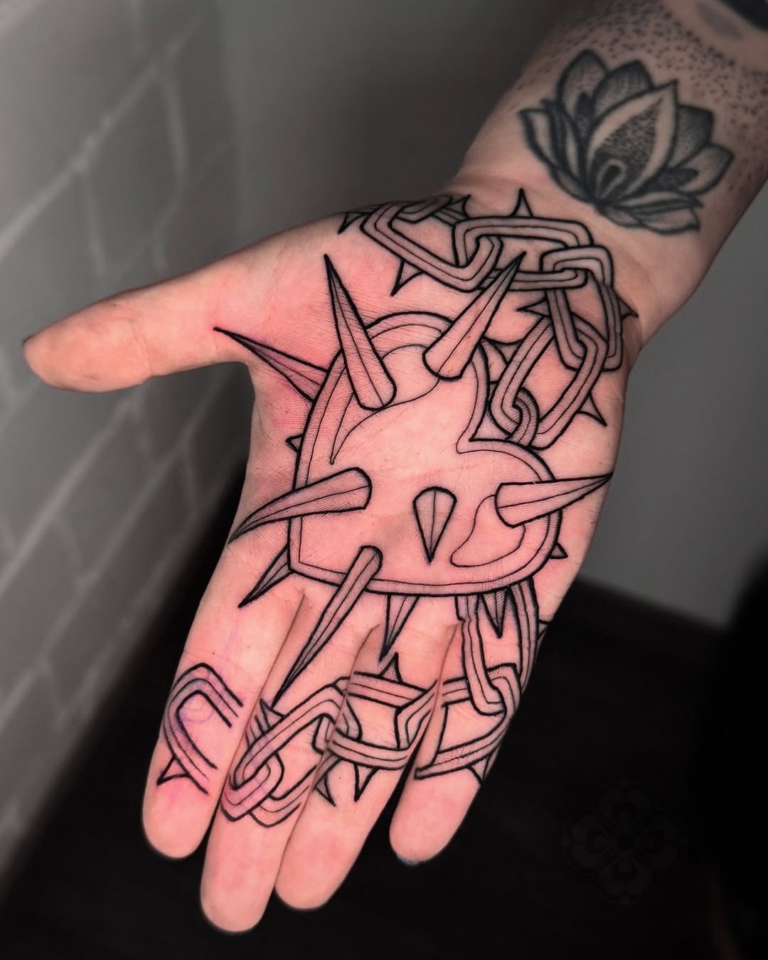 Edgy heart tattoo with chains and spikes Tattoo Design