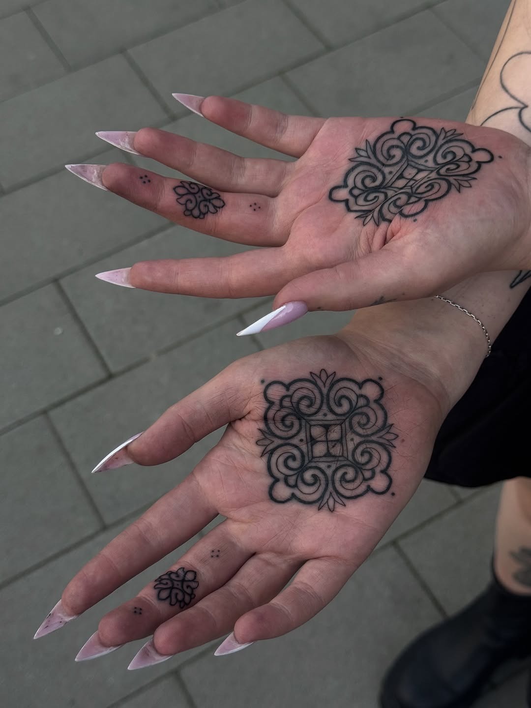 Elegant palm tattoos showcase unique artistry. Tattoo Design
