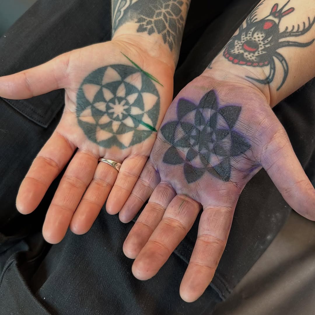 Intricate geometric designs on palm tattoos Tattoo Design