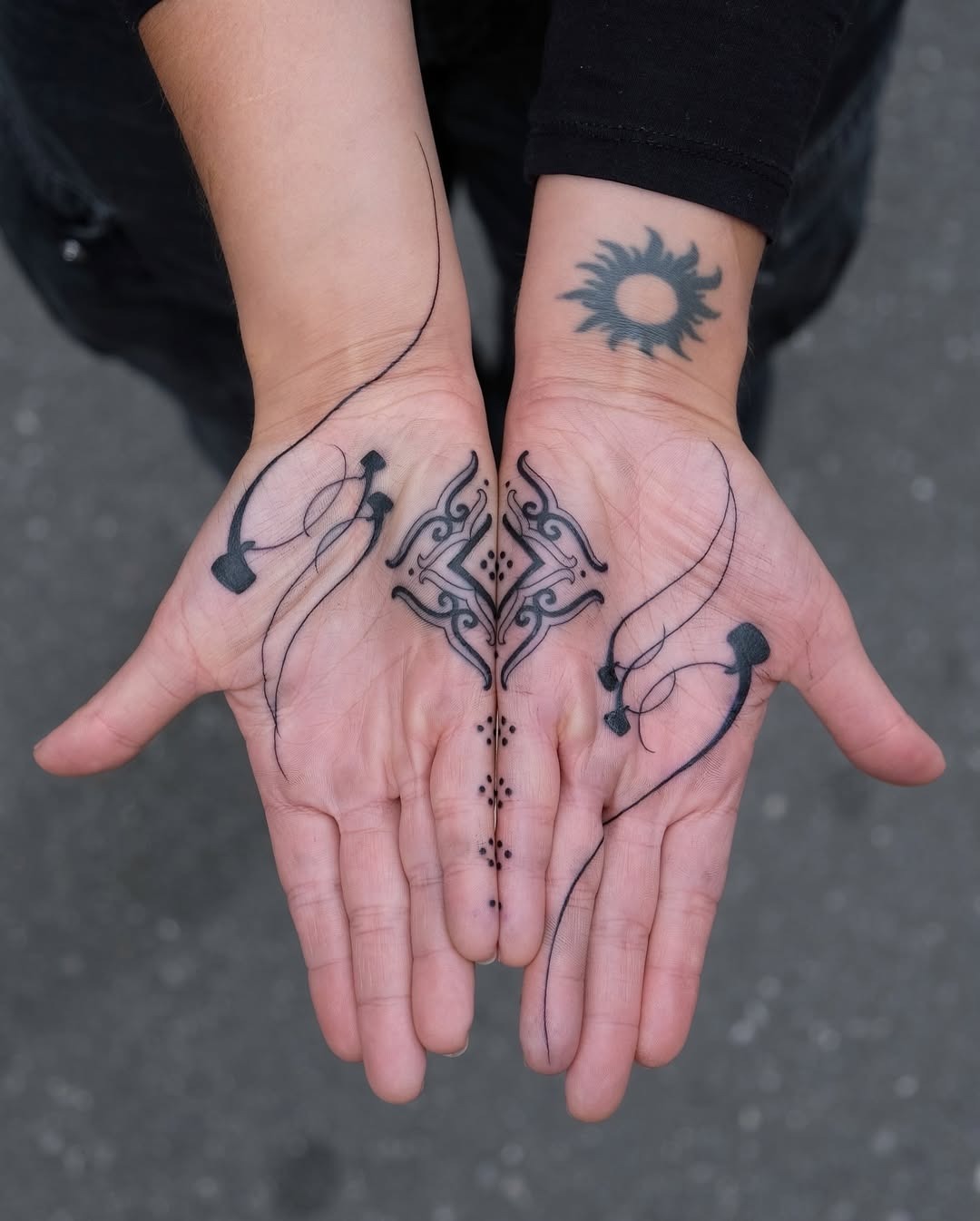 Intricate palm tattoo designs with symmetry. Tattoo Design