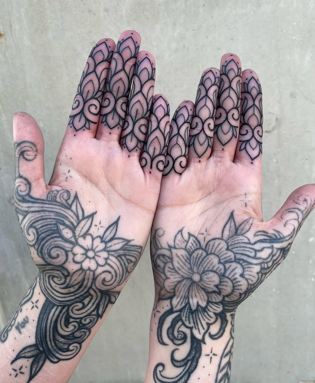 Intricate palm tattoos featuring floral designs Tattoo Design