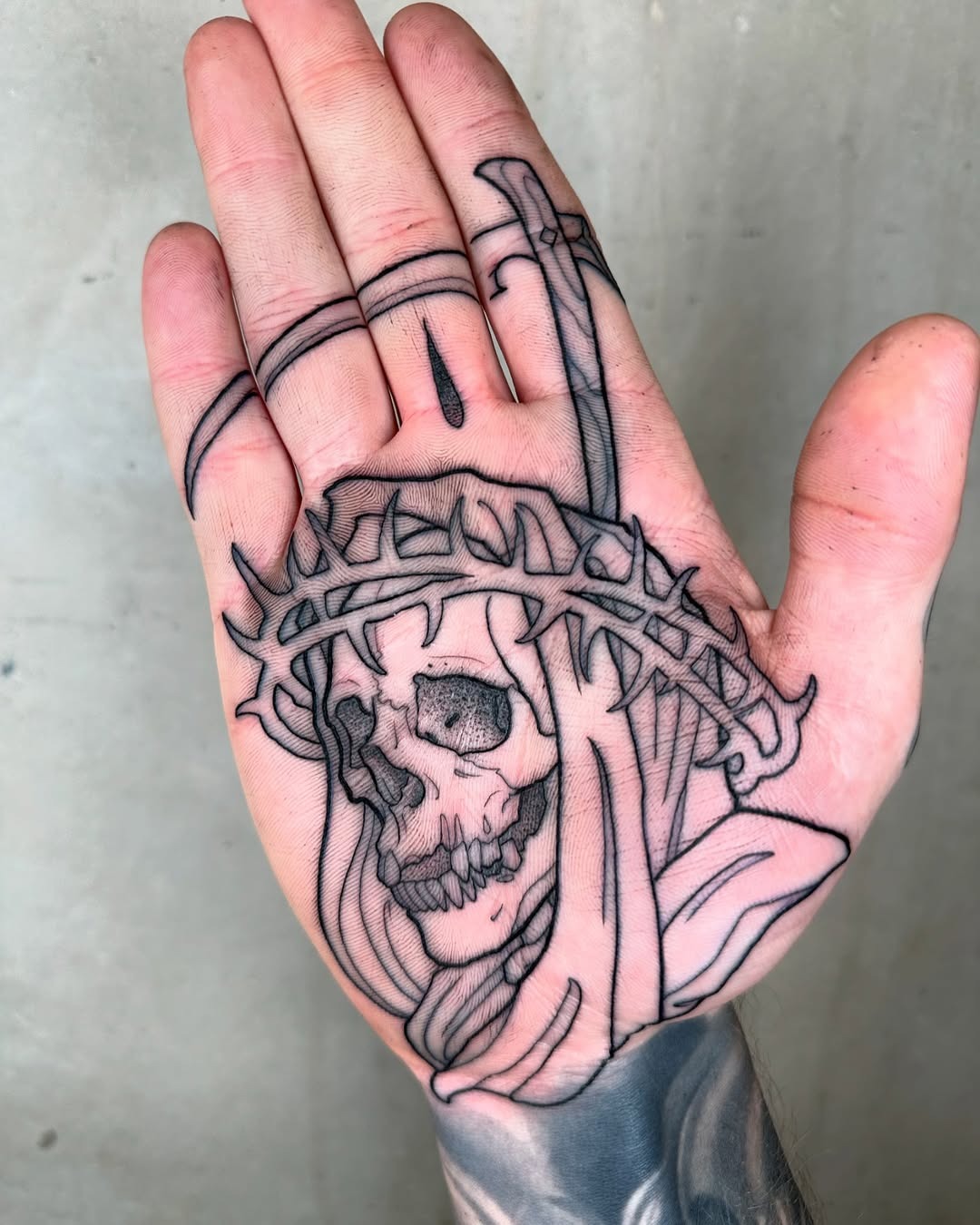 Intricate skull design with a sword detail Tattoo Design