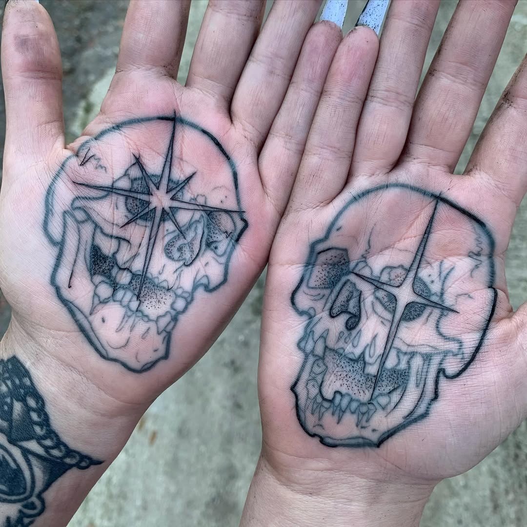 Striking palm skull tattoos with intricate details Tattoo Design