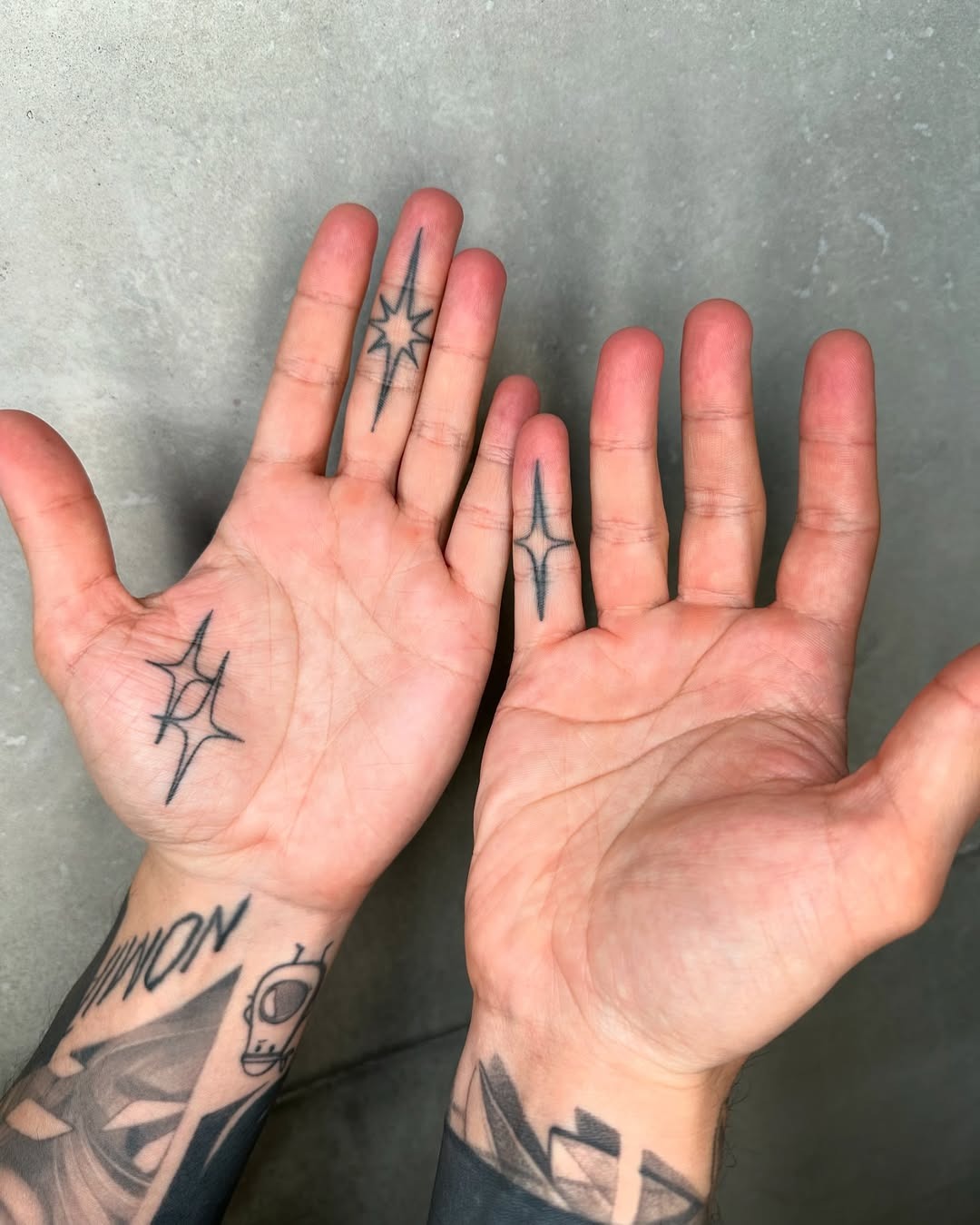 Unique black ink palm tattoo designs showcased Tattoo Design