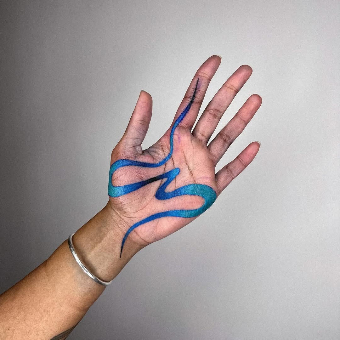 Vibrant blue curves on palm tattoo design Tattoo Design