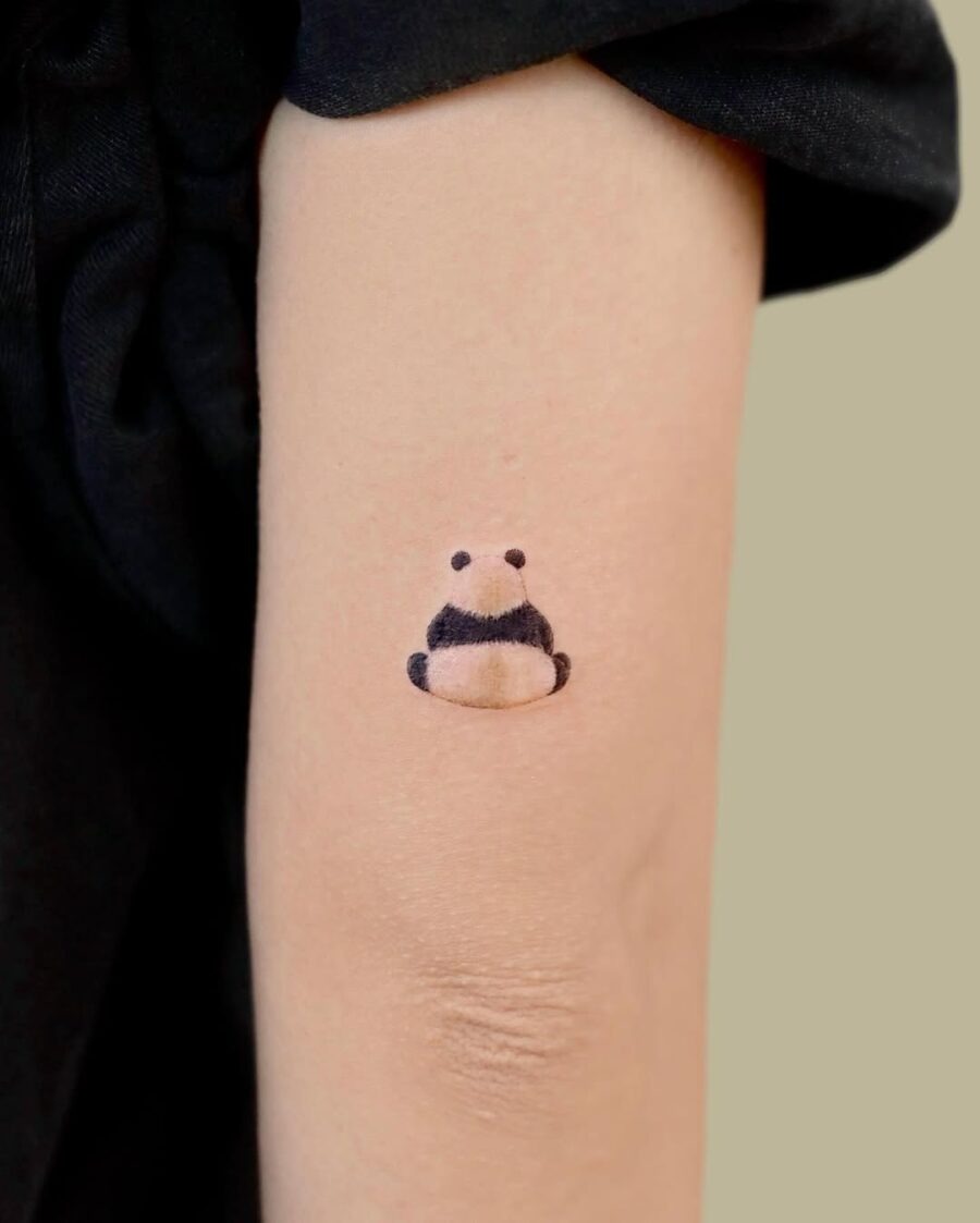 Adorable panda tattoo adding charm to skin. Tattoo Design
