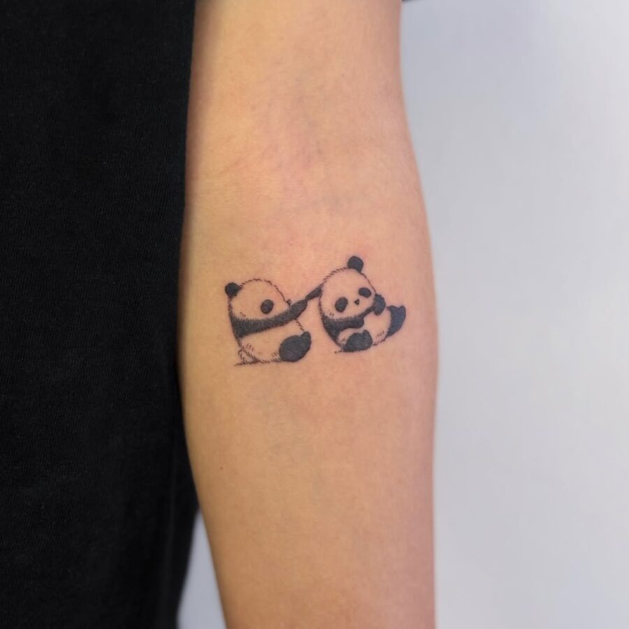 Adorable panda tattoo design on the arm Tattoo Design