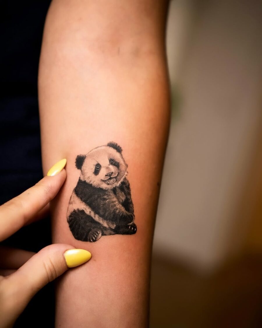 Adorable panda tattoo on forearm Tattoo Design