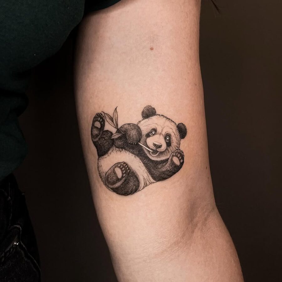 Adorable panda tattoo with bamboo detail Tattoo Design