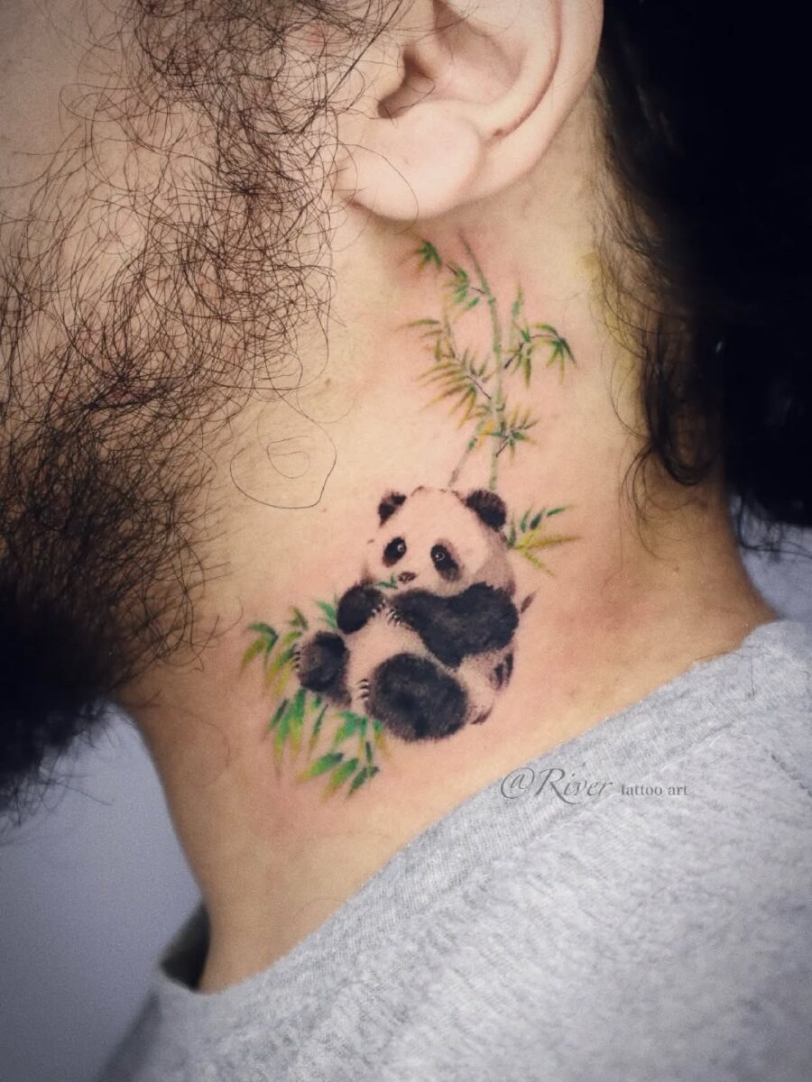 Charming panda tattoo nestled in bamboo Tattoo Design