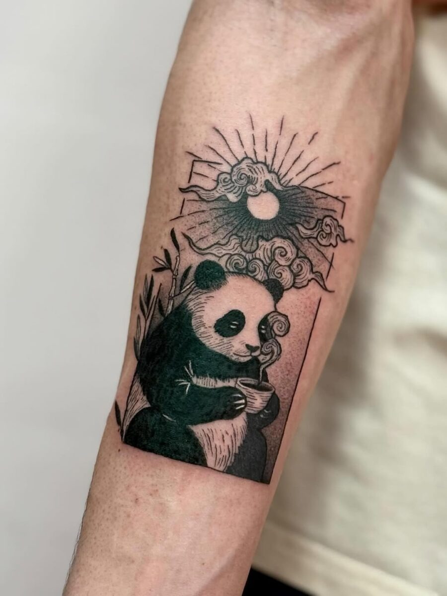 Charming panda tattoo with serene elements Tattoo Design