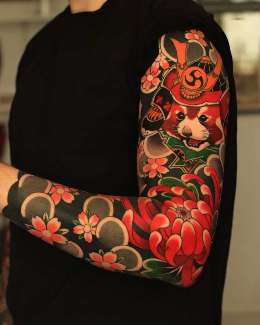 Vibrant Panda Tattoo with Floral Elements Tattoo Design