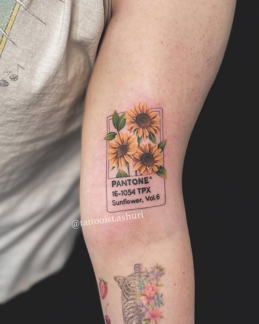 Colorful Pantone sunflower tattoo on arm Tattoo Design