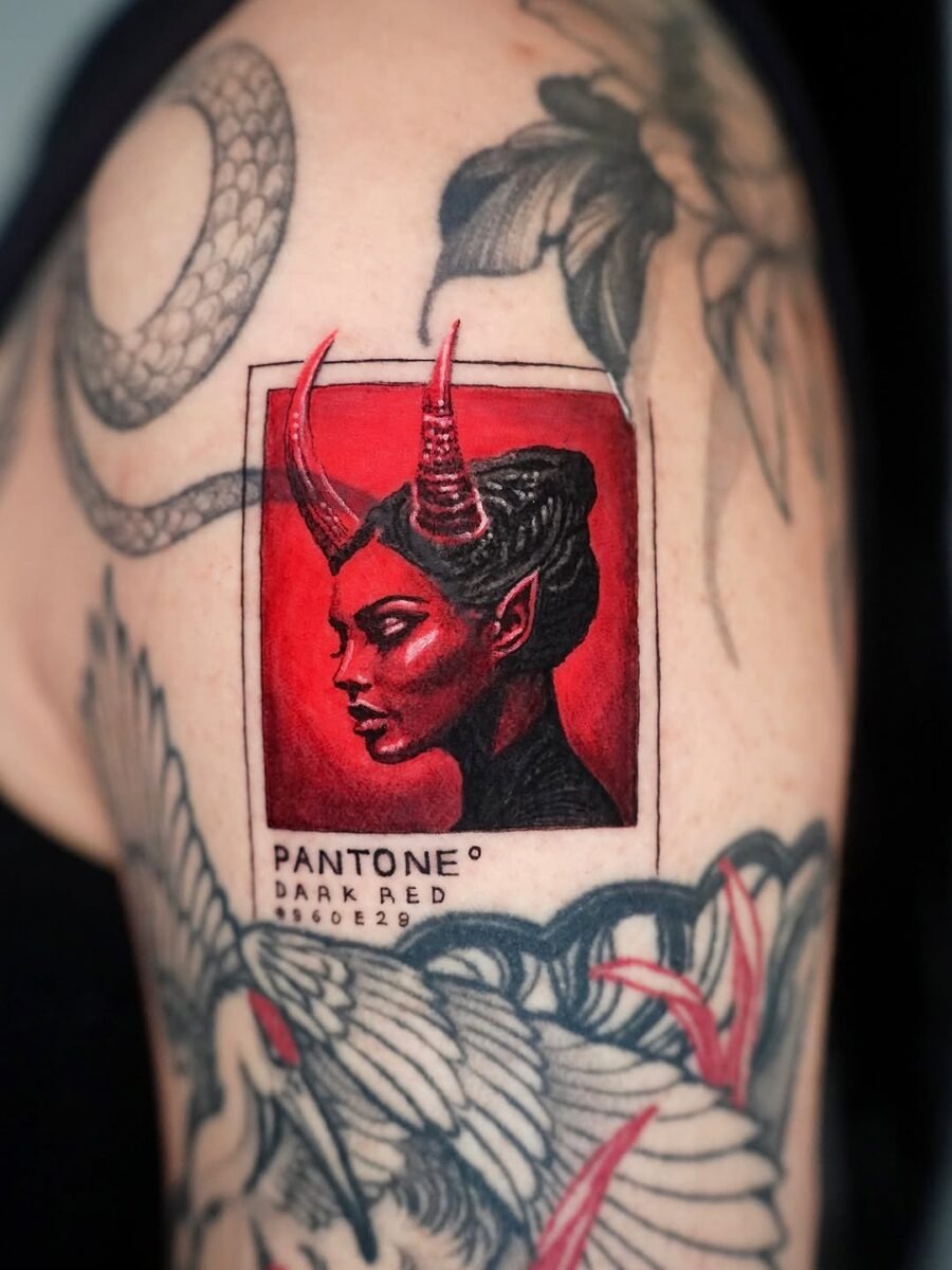Striking pantone tattoo blending color and design Tattoo Design