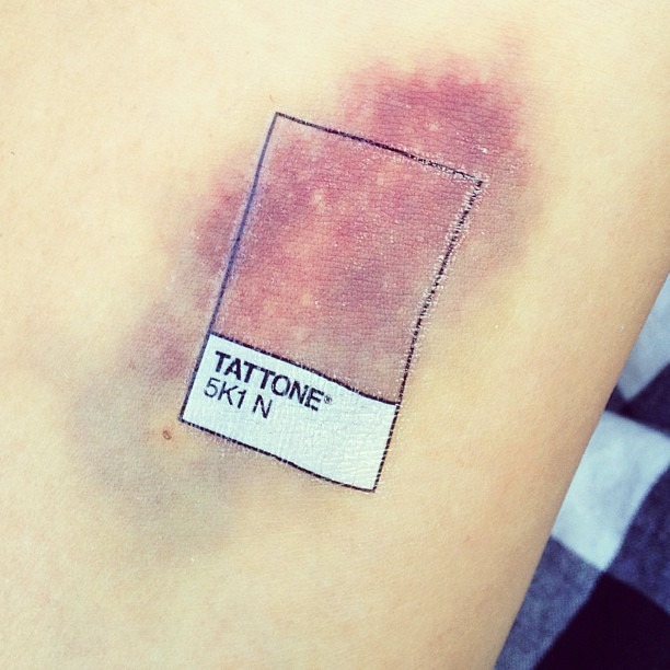 Unique Pantone tattoo showcasing color experimentation Tattoo Design