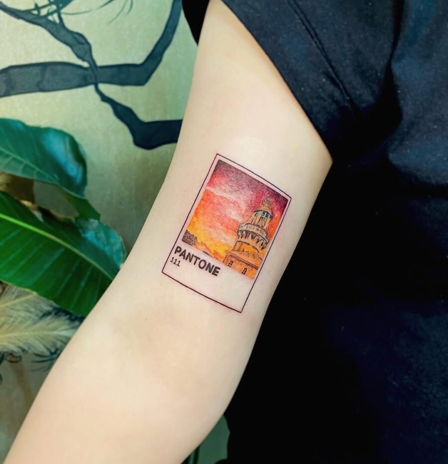 Vibrant Pantone Tattoo Featuring Iconic Landmark Tattoo Design