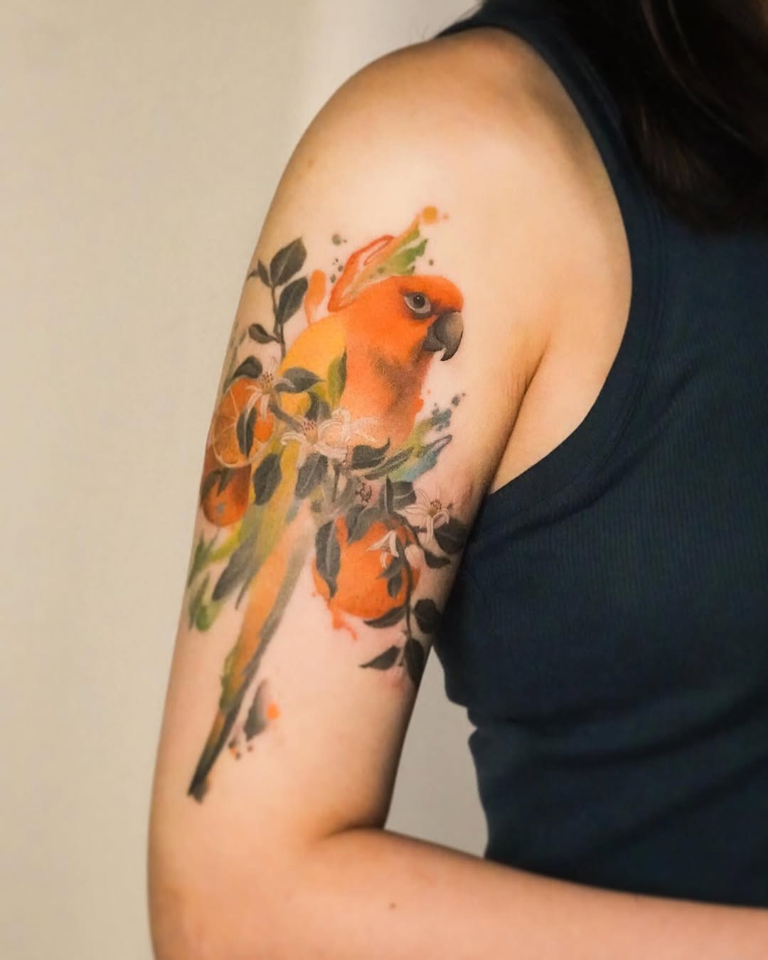 Vibrant Parrot Tattoo Surrounded by Nature Tattoo Design