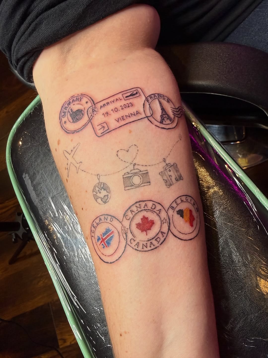 A unique travel stamp-inspired tattoo design Tattoo Design