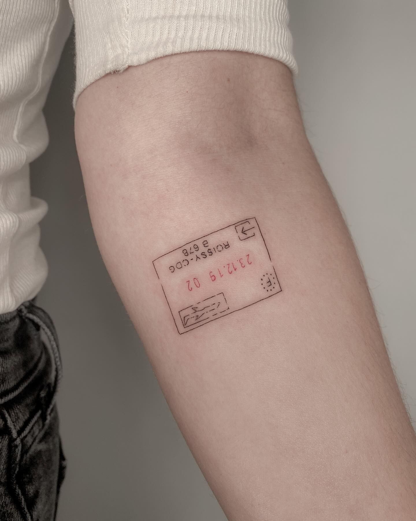 Creative Passport Tattoo on the Arm Tattoo Design