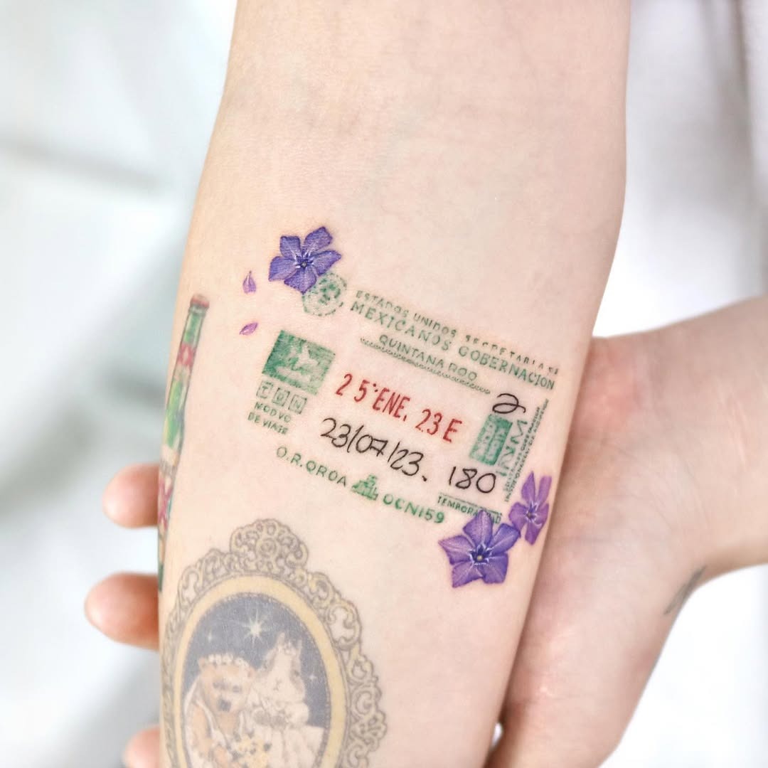 Creative passport tattoo with floral accents Tattoo Design