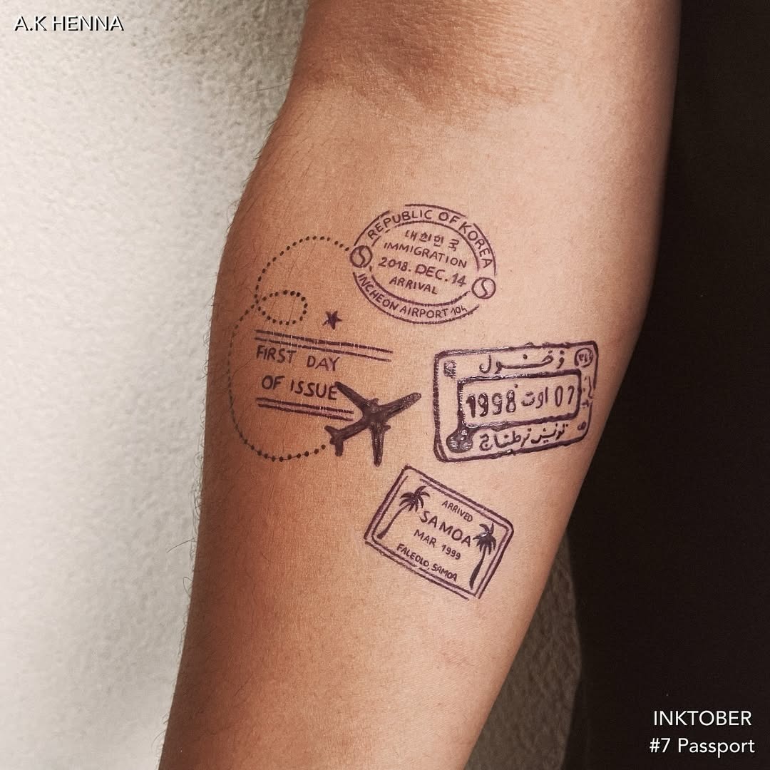 Creative passport tattoo with travel-themed stamps Tattoo Design