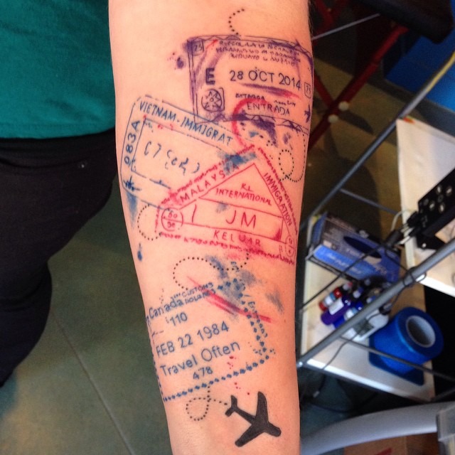 Creative Travel-Inspired Tattoo Featuring Stamps Tattoo Design