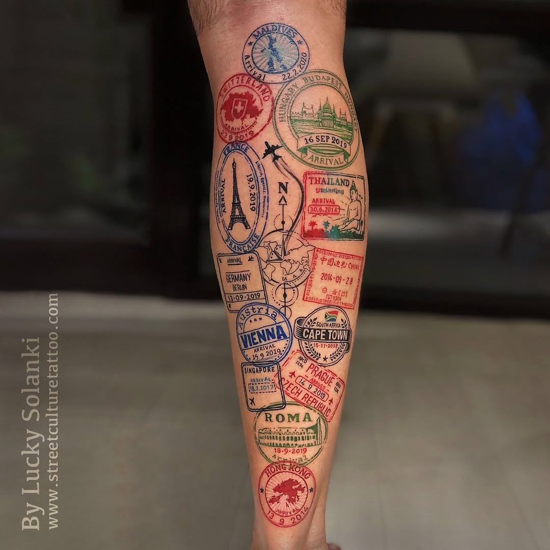 Vibrant travel stamp-inspired leg tattoo design Tattoo Design
