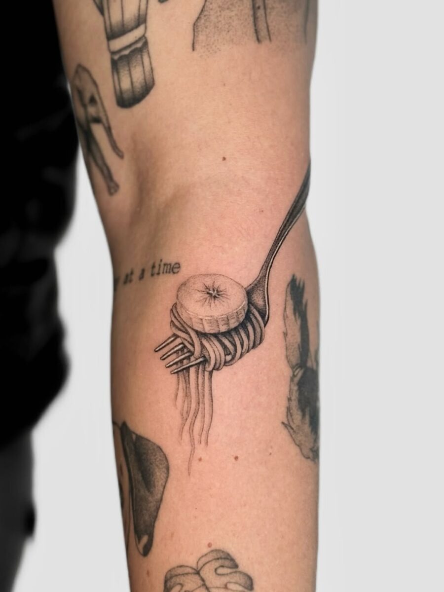 A whimsical fork with spaghetti tattoo design Tattoo Design