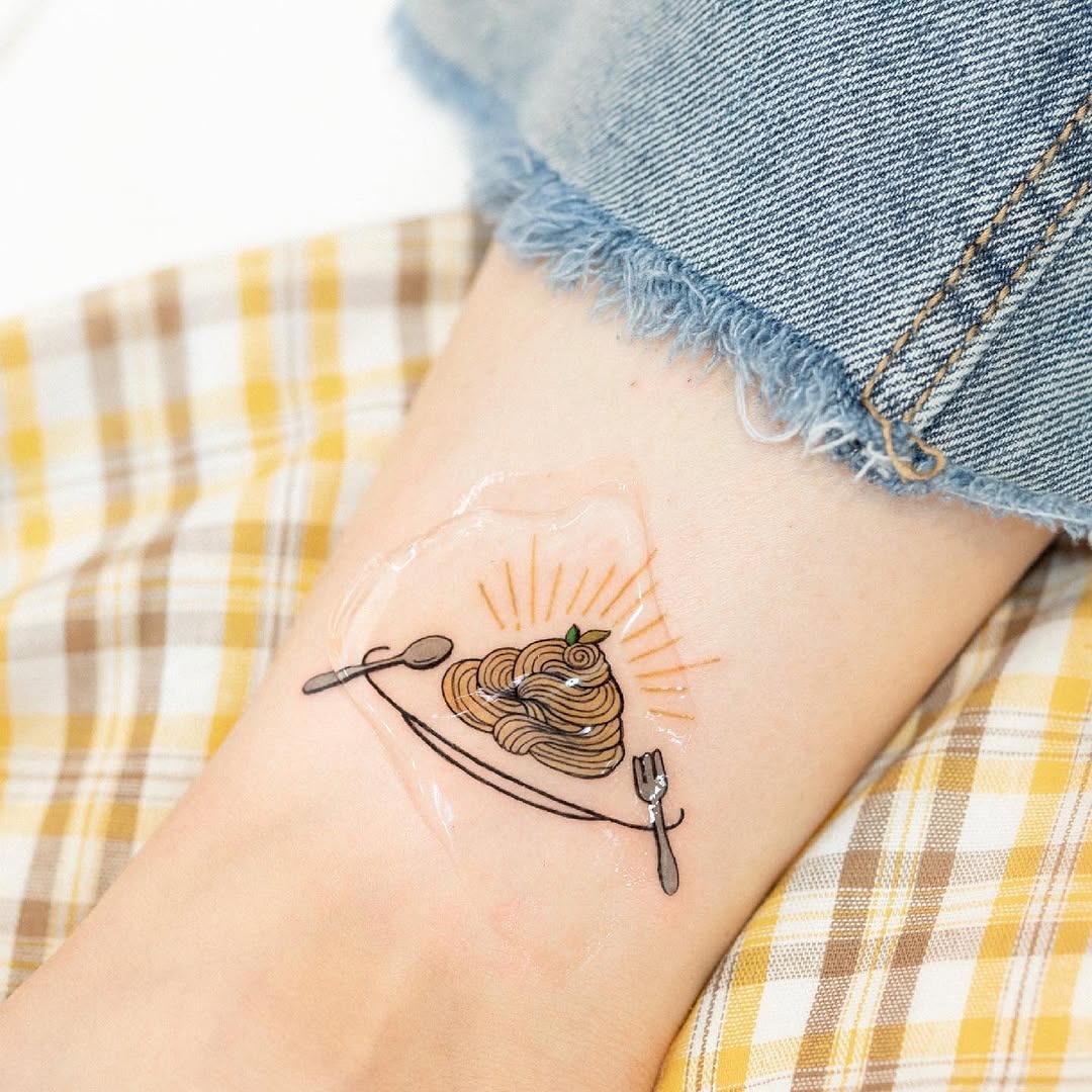 Charming spaghetti tattoo with playful cutlery design Tattoo Design