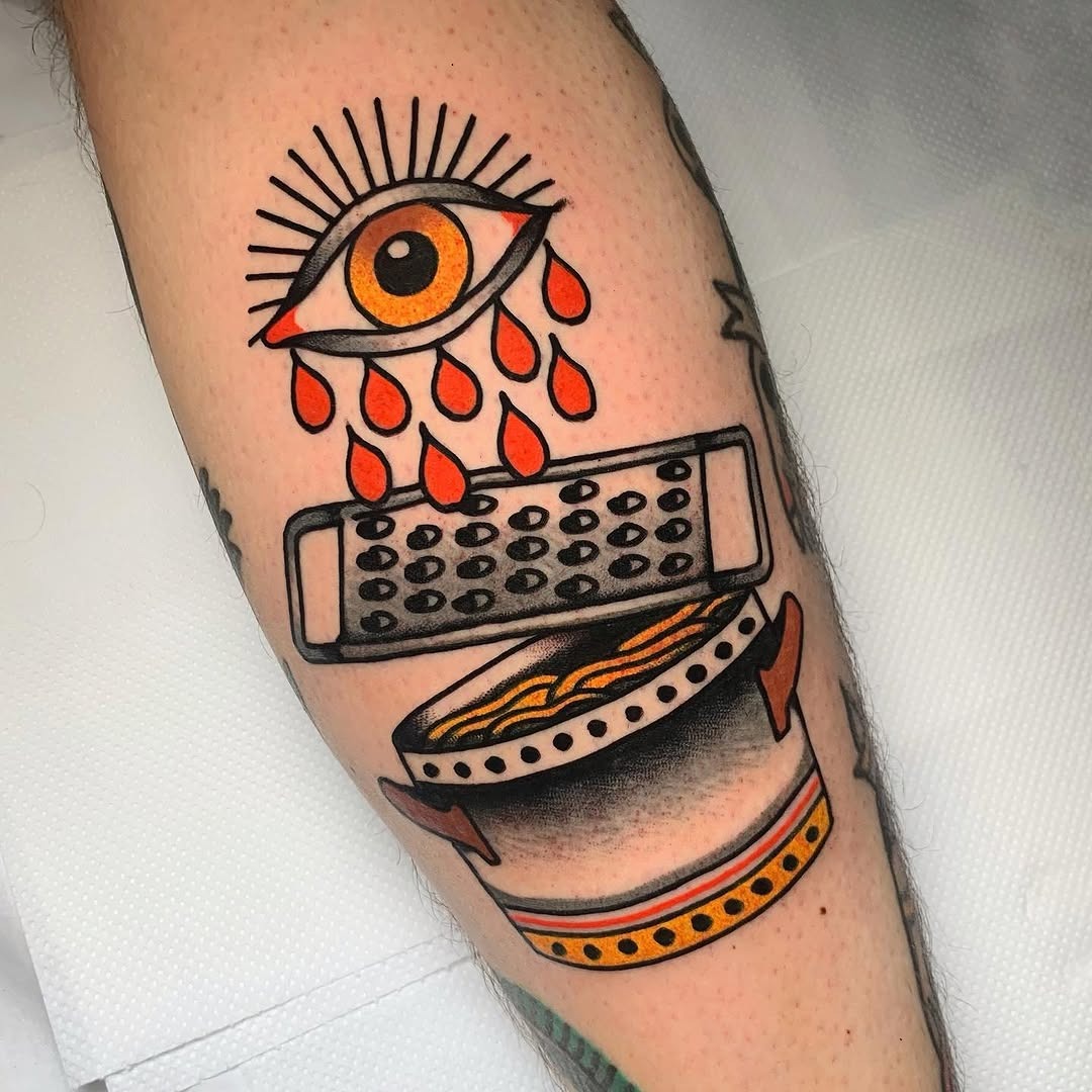 Unique pasta tattoo blending eyes and graters Tattoo Design