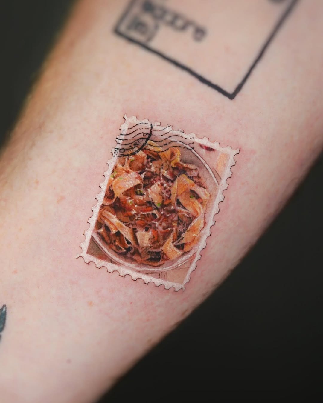 Whimsical pasta tattoo resembling a postage stamp Tattoo Design