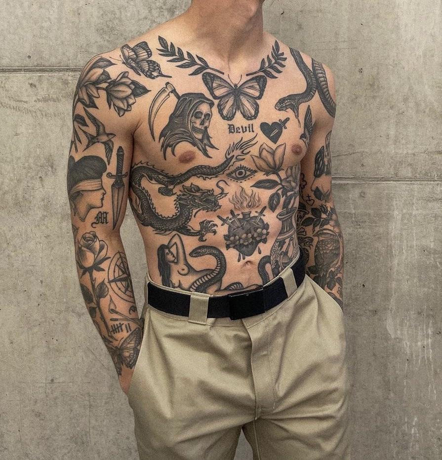 Bold Blackwork Patchwork Chest and Torso Tattoo Tattoo Design