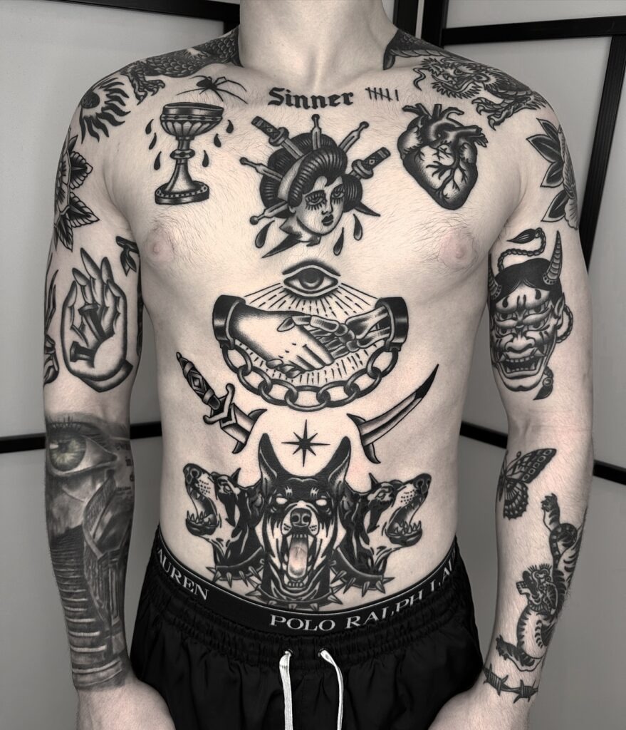 Dark Symbolic Chest and Stomach Patchwork Tattoo Tattoo Design