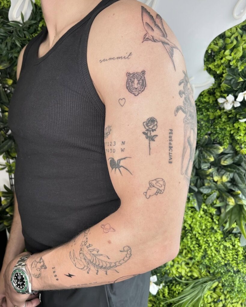 Edgy Combat-Inspired Patchwork Tattoo Sleeve Tattoo Design