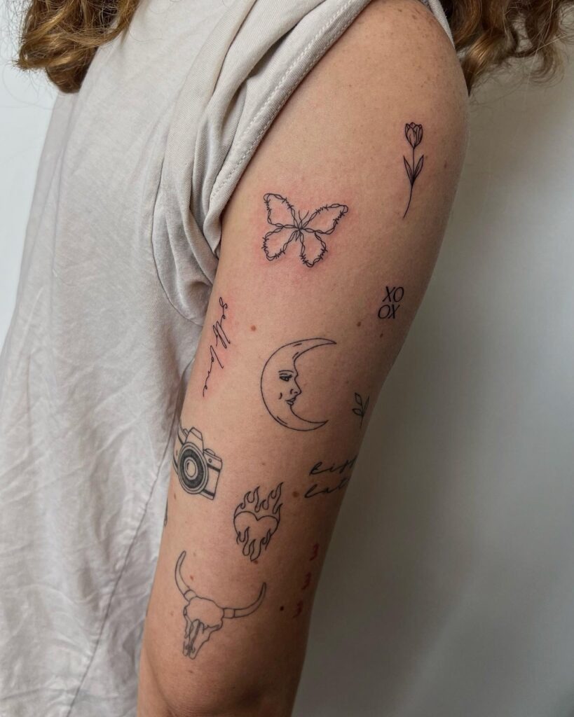 Whimsical Patchwork Arm Tattoo Tattoo Design
