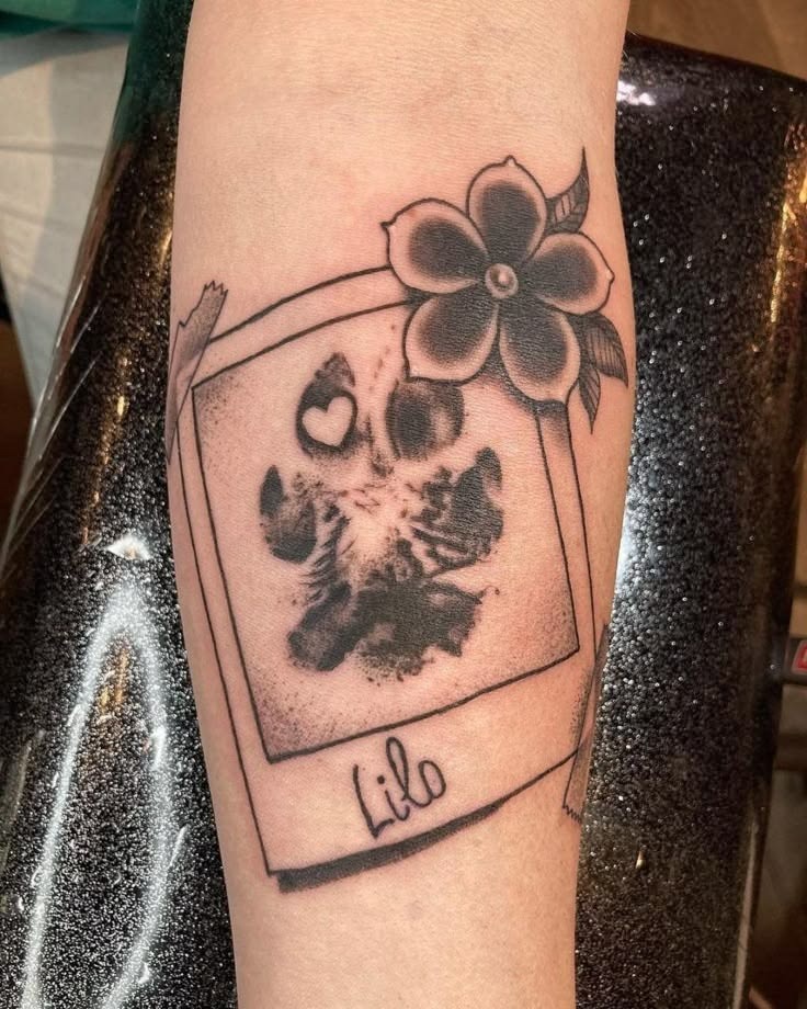 Framed Paw Print with Flower Memorial Tattoo Design