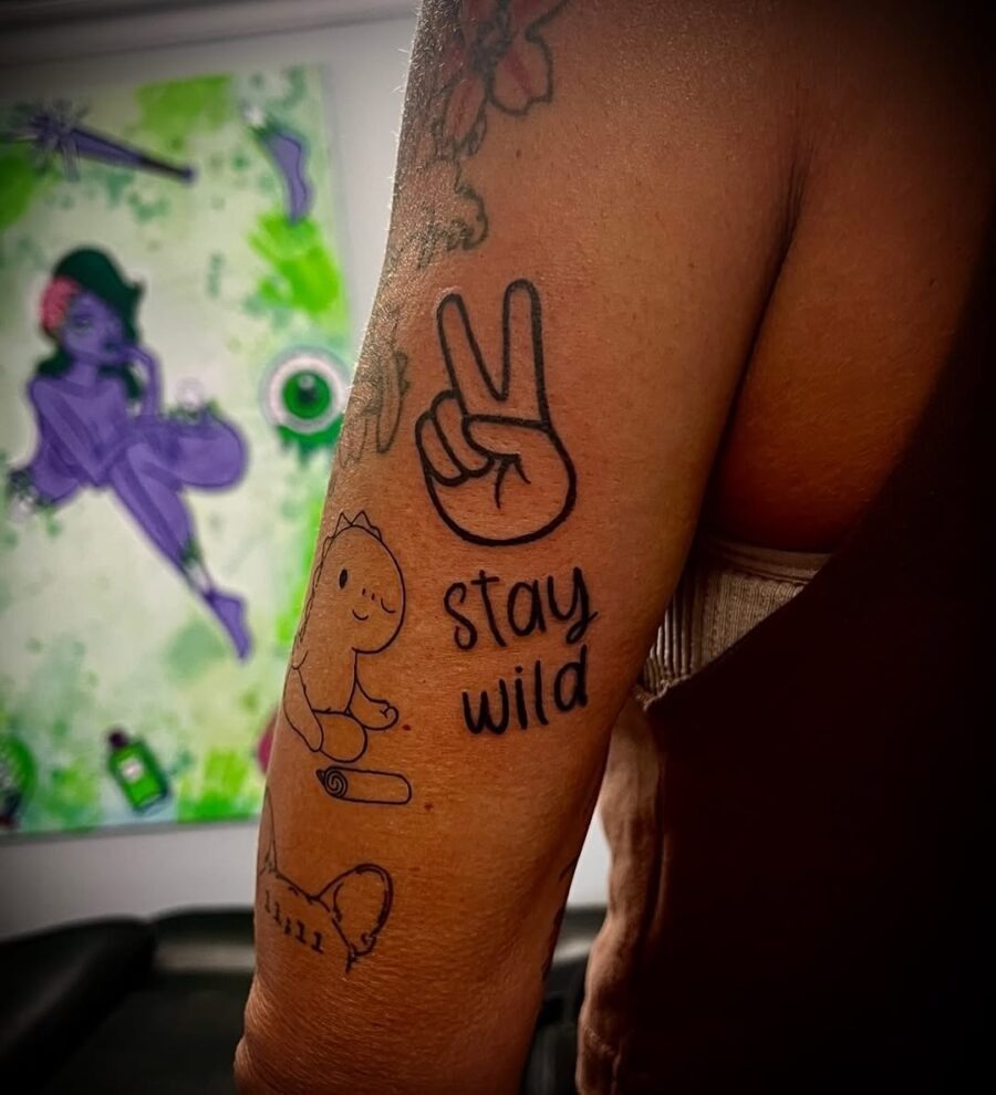 Celebrate individuality with playful peace tattoos Tattoo Design