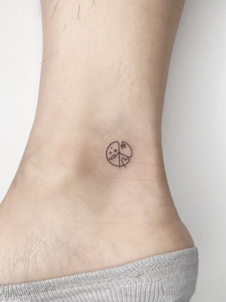 Charming minimalist peace symbol tattoo design Tattoo Design