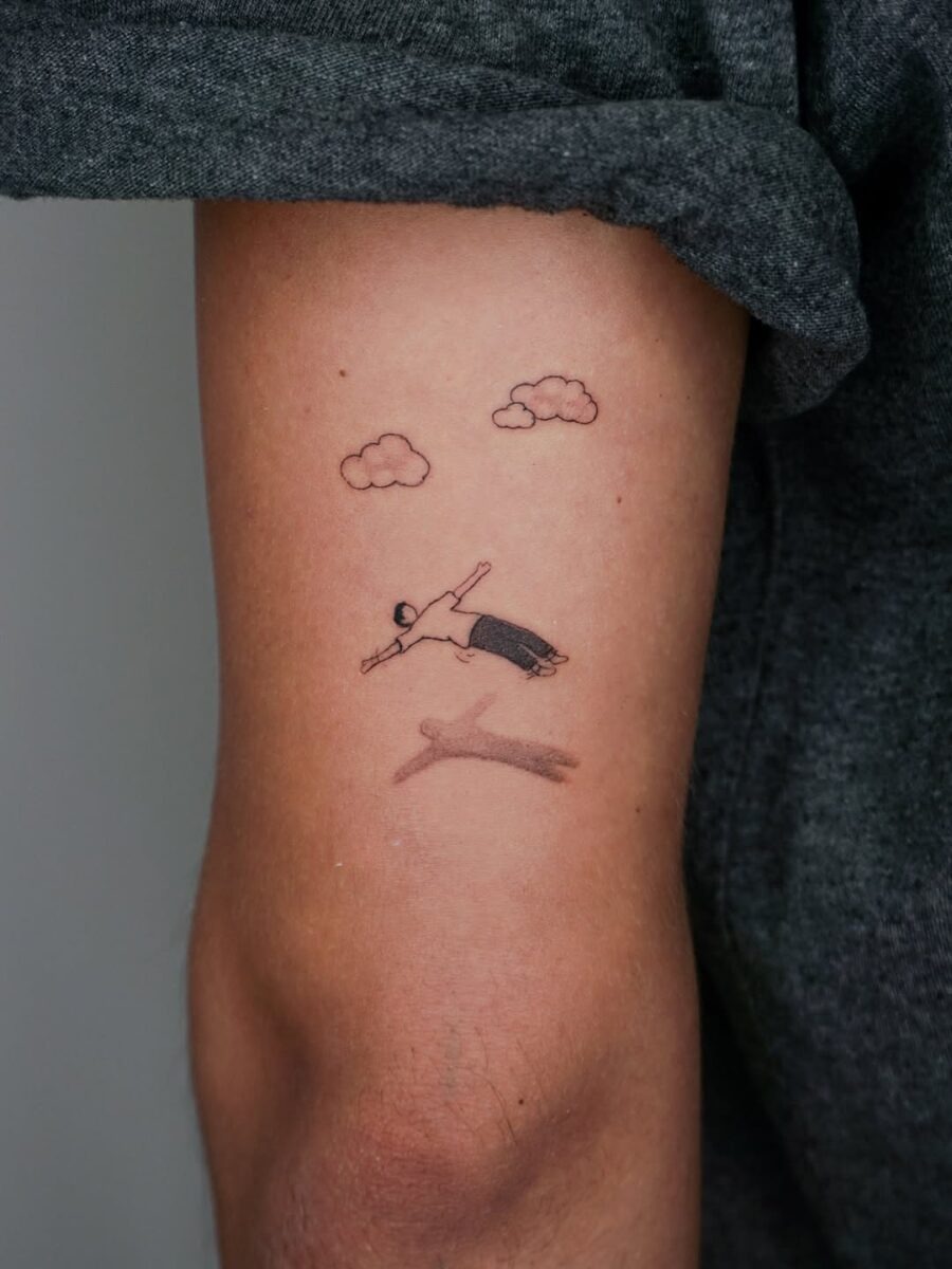 Minimalist swim tattoo for tranquility seekers Tattoo Design