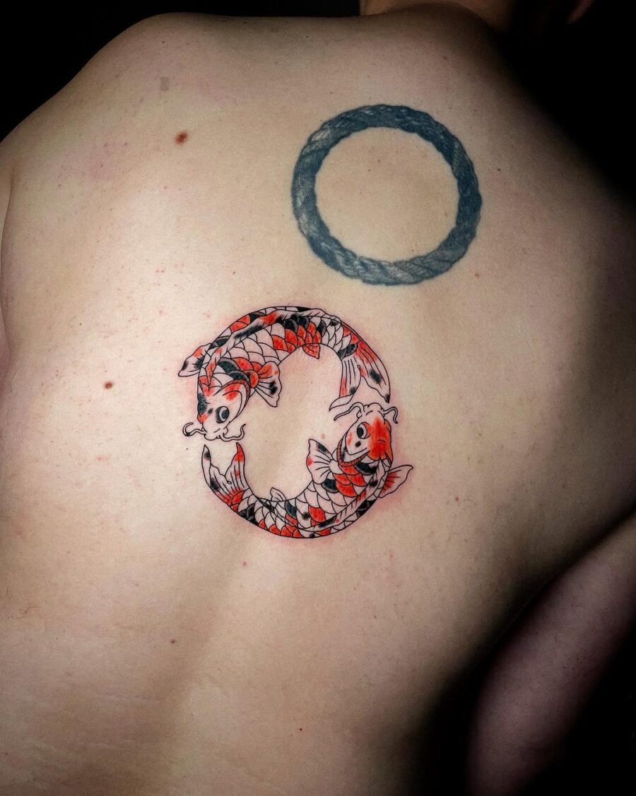 Symbolic koi fish tattoo represents harmony and balance Tattoo Design