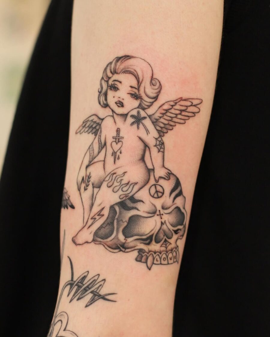 Unique angel tattoo radiating peace vibes Tattoo Design