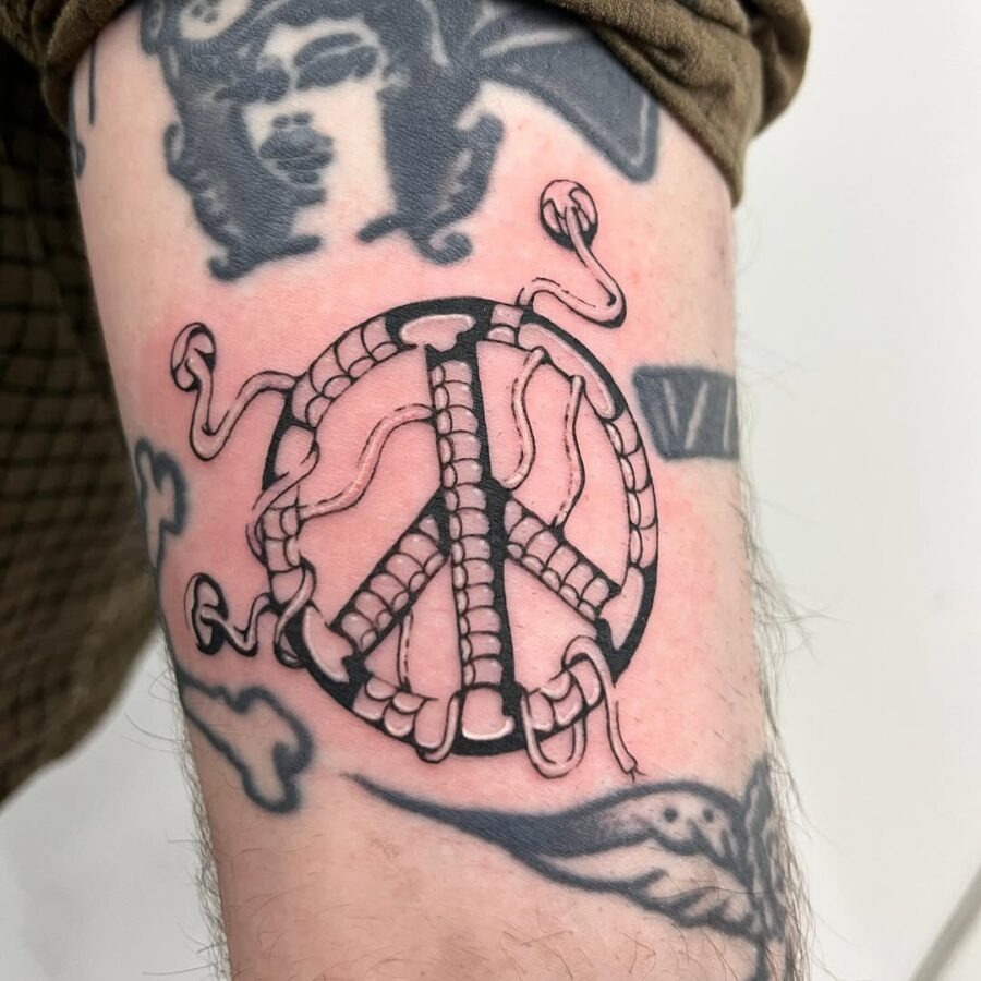 Unique peace symbol intertwined with serpents Tattoo Design