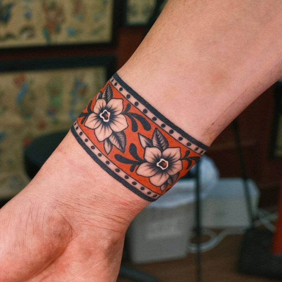 Vibrant floral peace tattoo on wrist Tattoo Design