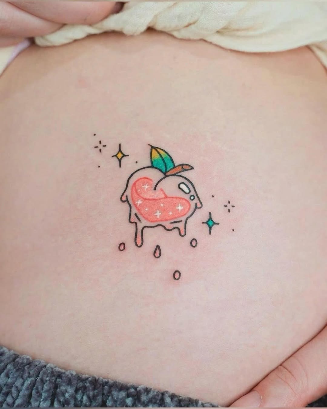 Adorable peach tattoo with a whimsical vibe Tattoo Design