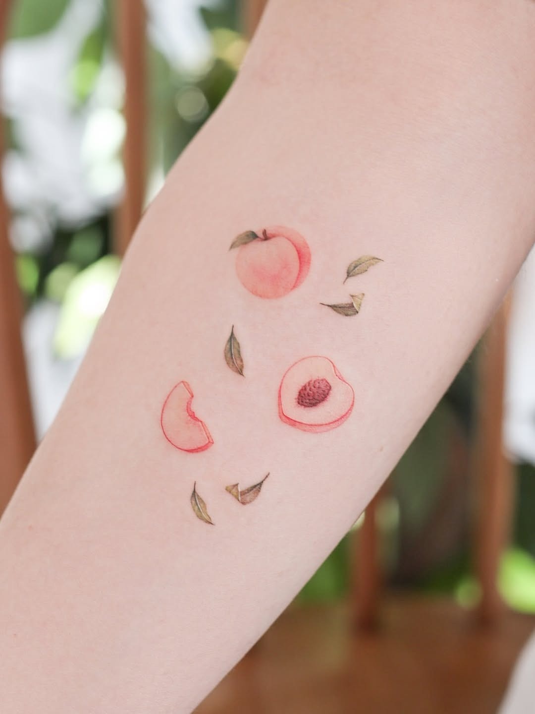 Charming peach tattoos with delicate details Tattoo Design
