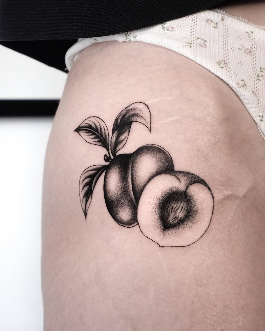 Elegant black and gray peach tattoo design Tattoo Design