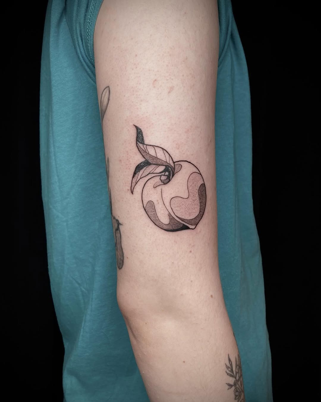 Stylish minimalist peach tattoo on the arm Tattoo Design